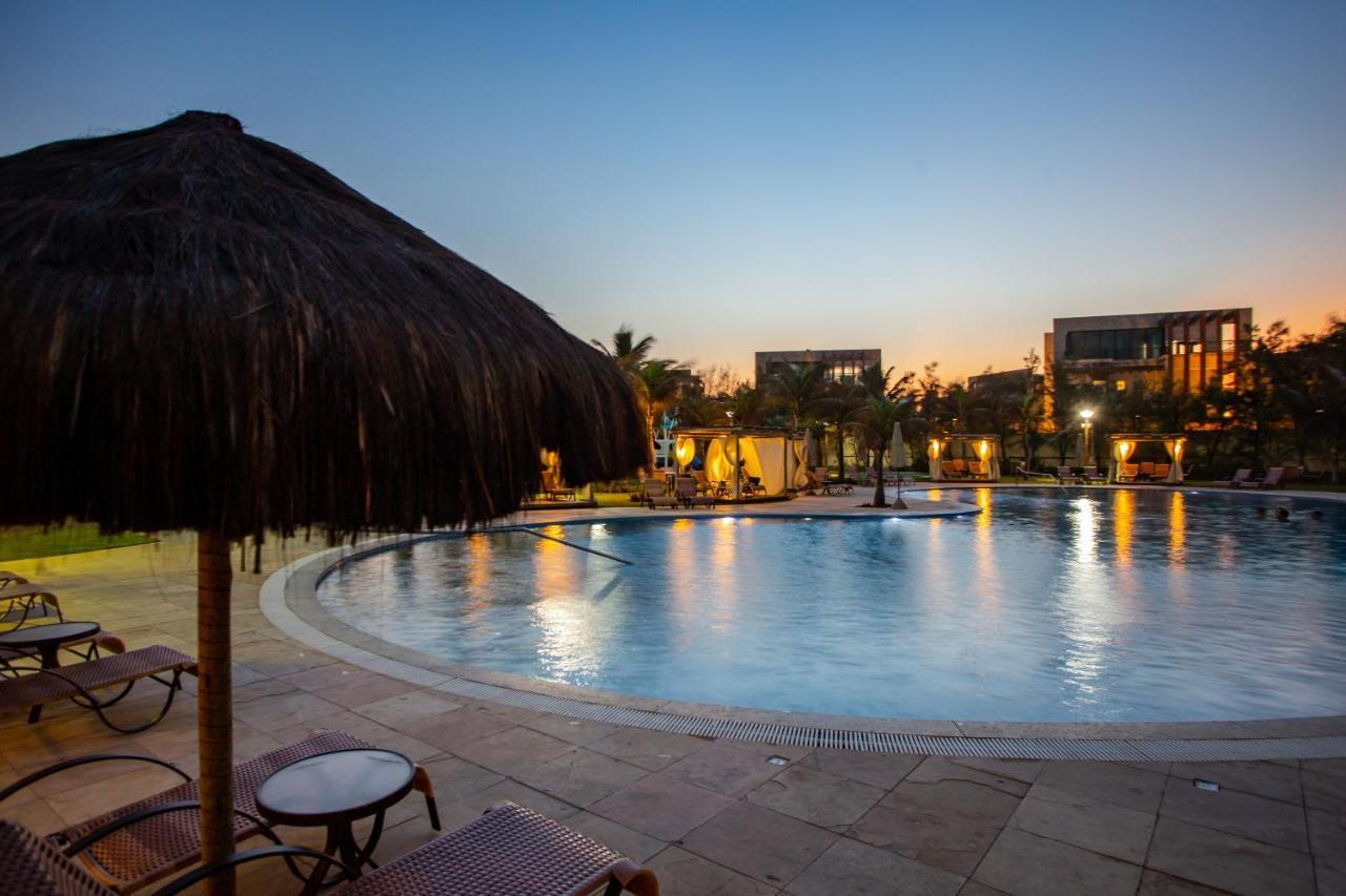 Dom Pedro Laguna Beach Resort & Golf By Wam Experience Aquiraz Kültér fotó The pool at the Hilton Alexandria Golf Resort
